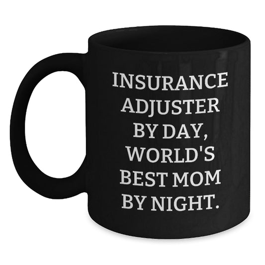 Insurance Adjuster Gifts by Day, World's Best Mom By Night. Funny Graduation Gifts for Insurance Adjuster from Friends, Family, or Coworkers - Black Coffee Mug - Main