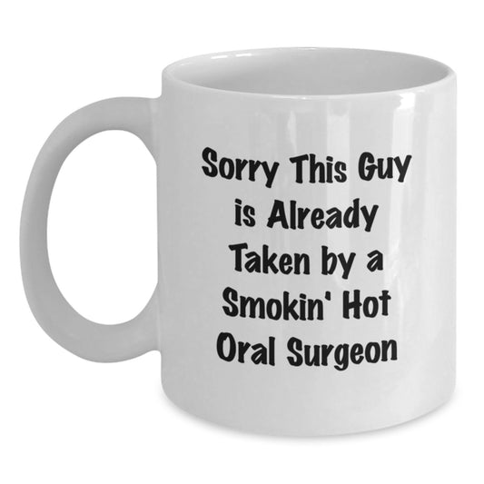 Funny Oral Surgeon Gifts from Friends, Unique White Coffee Mug for Birthday, 'Sorry This Guy Is Already Taken By A Smokin' Hot Oral Surgeon' - Main
