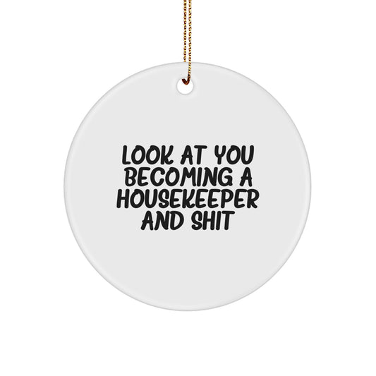 Funny Housekeeper Gifts from Family, Unique Circle Ornament for Housekeeper, Christmas Unique Gifts - 'Look At You Becoming A Housekeeper And Shit' - Image 1