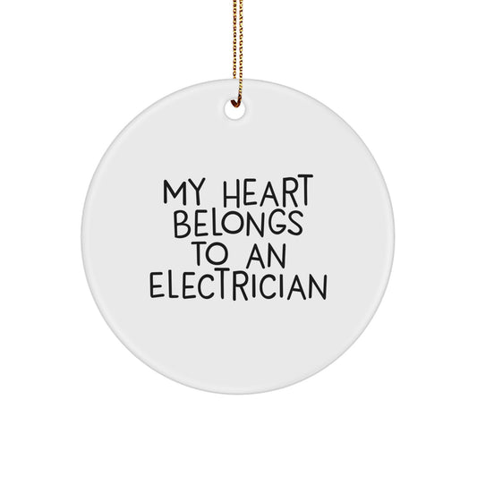 Funny Electrician Gifts for Men - Christmas Unique Circle Ornament from Loved Ones, 'My Heart Belongs To An Electrician' Quote - Image 1