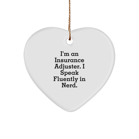Funny Insurance Adjuster Gifts from Friends for Christmas - Heart Ornament with 'I'm An Insurance Adjuster. I Speak Fluently In genius.' Quote - Image 1