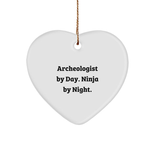 Archeologist Gifts from Men to Archeologist Friends - Heart Ornament with Funny Quote Archeologist By Day. Ninja By Night. Christmas Unique Gifts - Image 1