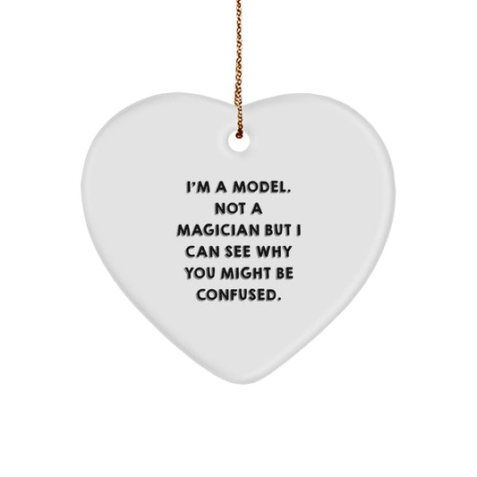 Funny Model Gifts for Christmas - Heart Ornament with Gold Cord - 'I'm A Model. Not A Magician But I Can See Why You Might Be Confused.' Quote for Model Lovers - Image 1