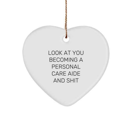 Funny Personal Care Aide Gifts from Men or Women to Friends, Coworkers, or Family - Heart Ornament for Christmas Unique Gifts - 'Look At You Becoming A Personal Care Aide And Shit' - Image 1
