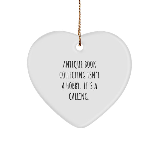 Antique Book Collecting Gifts from Friends, Heart Ornament for Christmas, 'Antique Book Collecting Isn't A Calling.' Quote, White Heart-Shaped MDF with Sublimation Finish - Image 1