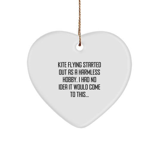 Funny Kite Flying Gifts from Friends for Christmas, Kite Flying Heart Ornament, 'Kite Flying Started Out As A Harmless Hobby...' - Image 1