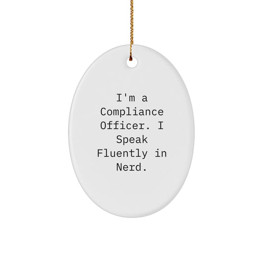 Compliance Officer Gifts: 'I'm A Compliance Officer. I Speak Fluently In genius.' Oval Ornament for Christmas, Funny Quote, White, 3.25'' Tall, Durable MDF, Gift from Friends, Coworkers, or Family - Image 1