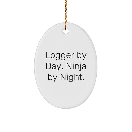 Logger Gifts by Day, Ninja Gifts by Night, Oval Ornament for Christmas - Image 1