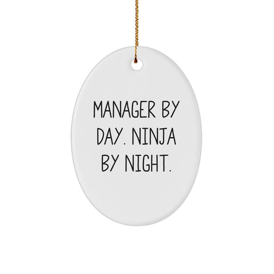 Funny Manager Christmas Unique Gifts from Friends and Family - 'Manager By Day. Ninja By Night.' Oval Ornament - Image 1