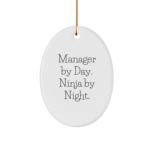 Funny Manager Gifts from Friends, Christmas Unique Oval Ornaments by Manager By Day. Ninja By Night., Perfect for Coworkers or Family - Image 1
