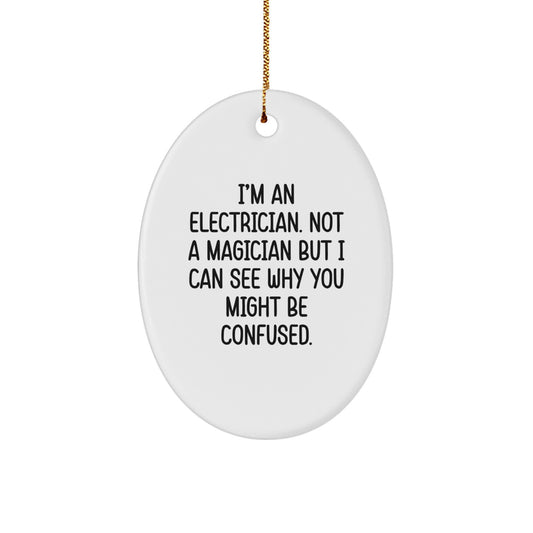 Funny Electrician Gifts for Men, Oval Ornament from Friends and Family, Christmas Unique Decorations - I'm An Electrician Not A Magician - Image 1