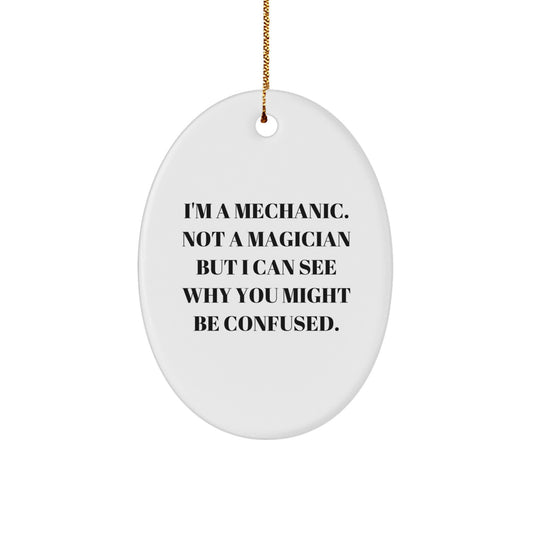 Funny Mechanic Gifts from Men for Friends, Oval Christmas Ornament for Mechanic Workshop Decor, 'I'm A Mechanic. Not A Magician But I Can See Why You Might Be Confused.' - Image 1