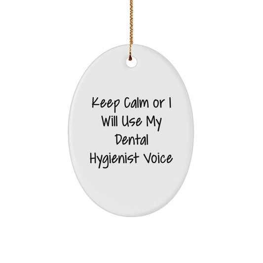 Dental Hygienist Gifts for Christmas - Keep Calm Or I Will Use My Dental Hygienist Voice, Oval Ornament with Funny Quote, Gifts from Friends to Coworkers - Image 1