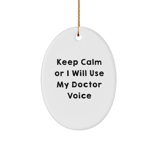 Funny Doctor Gifts for Her, Oval Ornament with 'Keep Calm Or I Will Use My Doctor Voice' Quote, Gifts from Women to Doctor Friends - Image 1