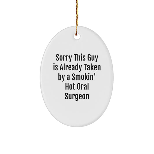 Oral Surgeon Gift for Christmas, 'Sorry This Guy Is Already Taken By A Smokin' Hot Oral Surgeon' Oval Ornament, Gifts from Friends - Image 1