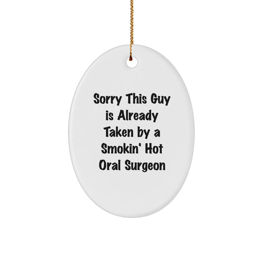 Oral Surgeon Gifts from Men to Friends - 'Sorry This Guy Is Already Taken By A Smokin' Hot Oral Surgeon' Oval Ornament for Christmas - Image 1