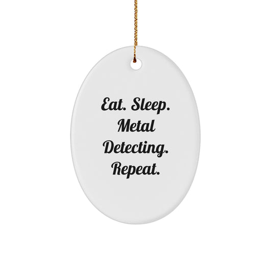 Metal Detecting Oval Ornament Gifts from Friends for Christmas - 'Eat. Sleep. Metal Detecting. Repeat.' - Image 1