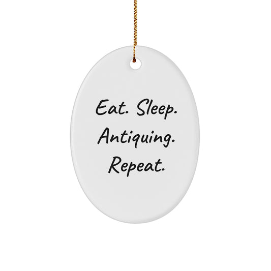 Antiquing Enthusiasts Gifts, Eat. Sleep. Antiquing. Repeat. Oval Ornament, Funny Quote, White, 3.25" Tall, Perfect for Christmas, Gifts from Friends, Gifts for Antiquing Enthusiasts - Image 1