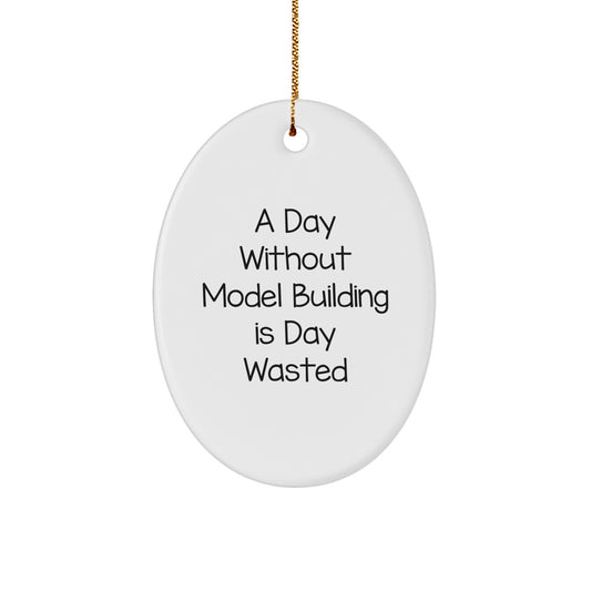 Model Building Lover Christmas Oval Ornament, Funny Quote Gifts from Friends for Family, A Day Without Model Building Is Day Wasted - Image 1