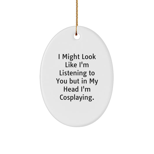 Funny Cosplaying Gifts from Friends - Oval Ornament with 'I Might Look Like I'm Listening...' Quote for Christmas - Image 1