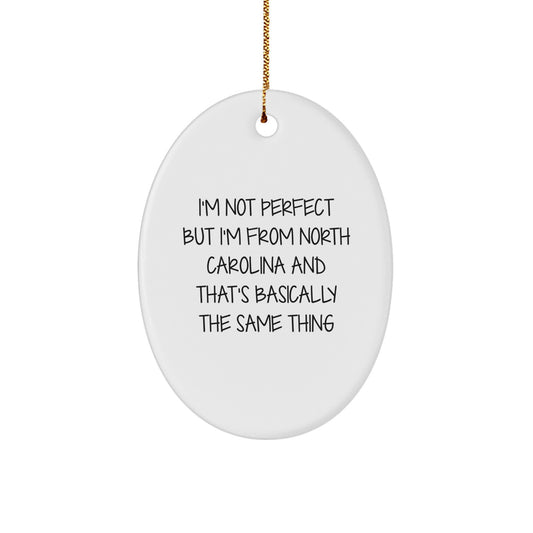North Carolina Gifts from Friends - Oval Ornament with Funny Quote I'm Not Perfect But I'm From North Carolina And That's Basically The Same Thing for Family Christmas Unique Gifts - Image 1
