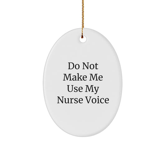 Funny Nurse Gifts for Christmas - Oval Ornament, Gifts from Men to Friends, 'Do Not Make Me Use My Nurse Voice' - Image 1