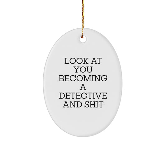 Funny Detective Gifts from Friends, Men, or Women for Christmas Unique Gifts - 'Look At You Becoming A Detective And Shit' Oval Ornament - Image 1