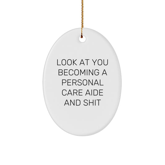Funny Personal Care Aide Gifts from Family - Oval Ornament Look At You Becoming A Personal Care Aide And Shit Christmas Unique Gifts - Decor For Personal Care Aide Men Women Friends - Image 1