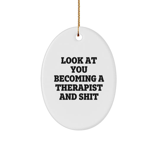 Funny Therapist Gifts from Friends to Family, Oval Ornament for Christmas Unique Presents, 'Look At You Becoming A Therapist And Shit' Quote - Image 1