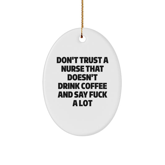 Funny Nurse Gifts for Christmas - Oval Ornament with 'Don't Trust A Nurse That Doesn't Drink Coffee And Say F--k A Lot' Quote, Gifts from Friends, Family, Coworkers, or Men to Women - Image 1