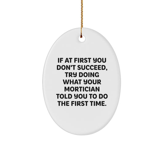Funny Mortician Gifts, Oval Ornament with Humorous Quote, Gifts from Men to Mortician, Unique Christmas Ornament for Mortician Friends and Family - Image 1