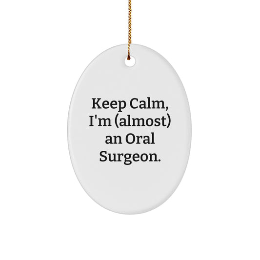 Funny Oral Surgeon Gifts from Friends, Christmas Unique Oval Ornament, 'Keep Calm, I'm (almost) An Oral Surgeon.', Gift for Oral Surgeon - Image 1