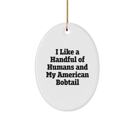 Gifts from Friends and Family, 'I Like A Handful Of Humans And My American Bobtail Cat' Oval Ornament for American Bobtail Cat Lovers, Christmas Unique Gift - Image 1