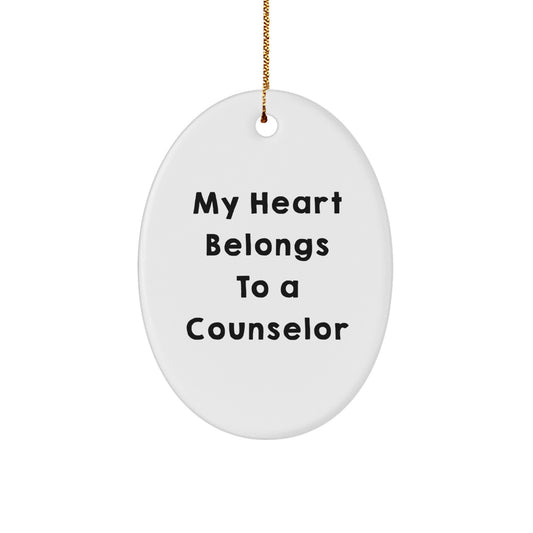 Funny Counselor Gifts from Family for Christmas Unique Oval Ornament My Heart Belongs To A Counselor - Image 1