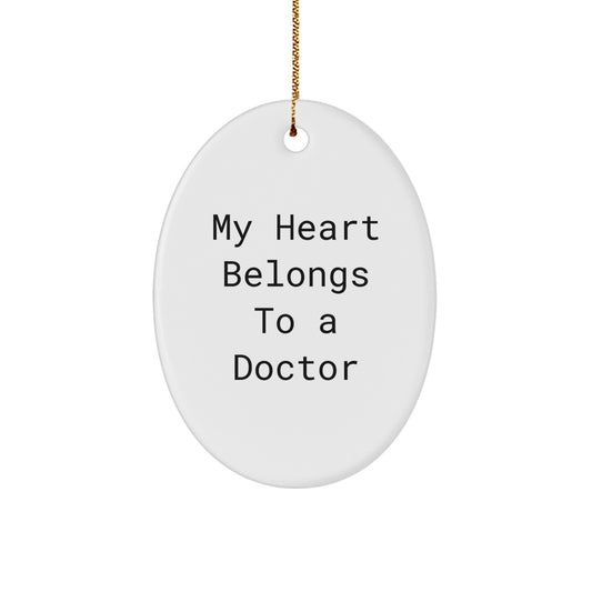 Funny Doctor Gifts for Men from Women - Oval Ornament with 'My Heart Belongs To A Doctor' Quote, Ideal Gift Idea for Christmas Unique Gifts - Image 1