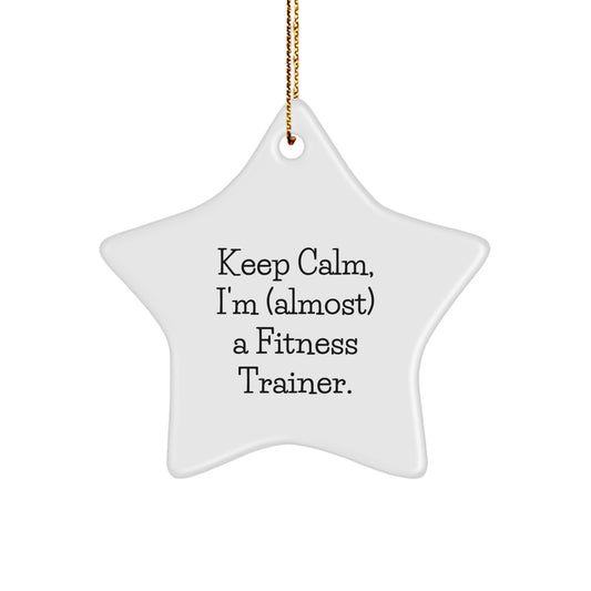 Funny Fitness Trainer Star Ornament, 'Keep Calm, I'm (almost) A Fitness Trainer.' Gifts from Friends, Coworkers, or Family for Christmas - Image 1